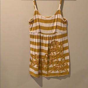 Inc mustard and ivory babydoll tank top.
